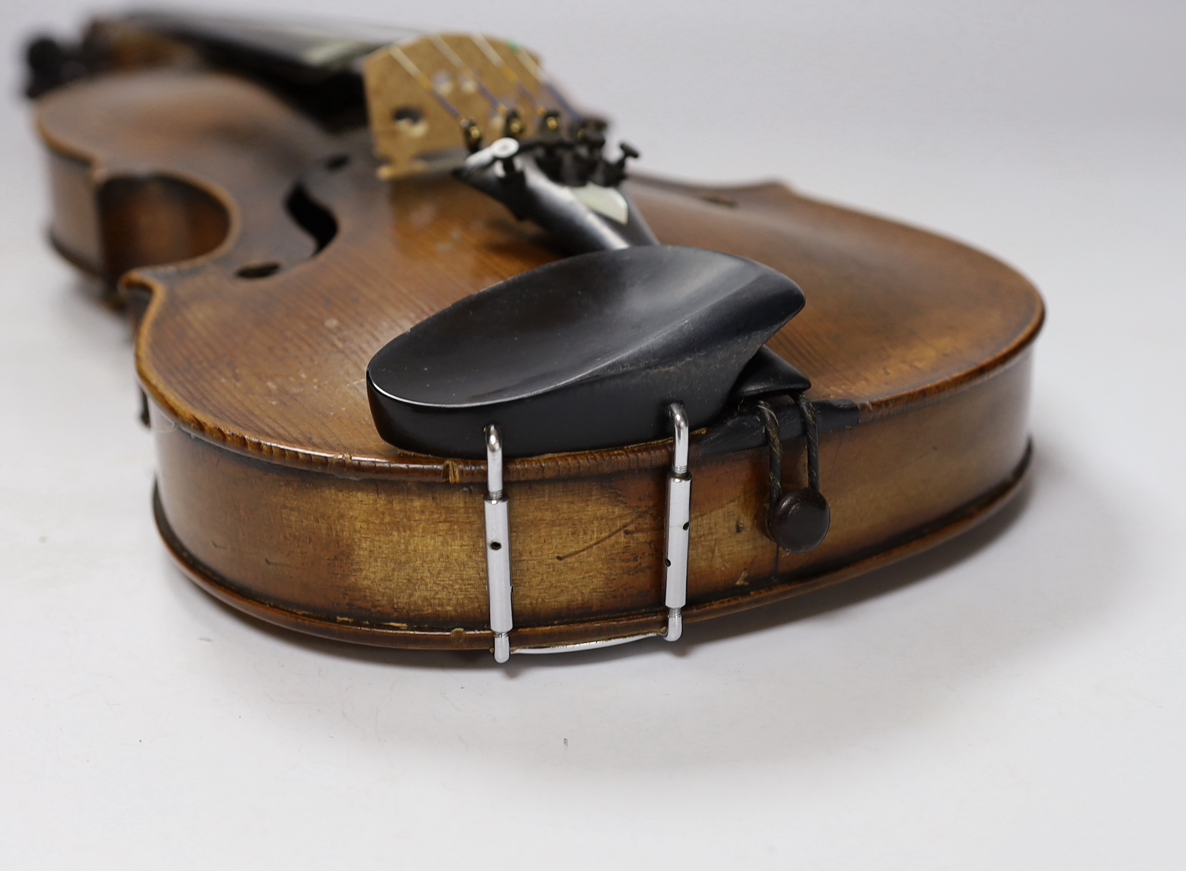 An early 20th century English violin stamped Norman Duke, London, one piece back with wax seal, cased, violin 60cm long